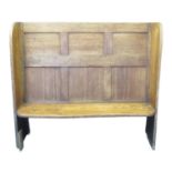 19th century oak high back settle, having fielded back, shaped sides and shaped moulded seat.