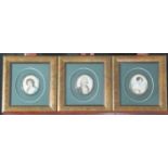 Three 18th/early 19th century portrait miniatures, probably a family group, father, mother and