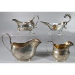 Georgian silver sauce boat standing on three shell feet, hallmarks for Dublin together with