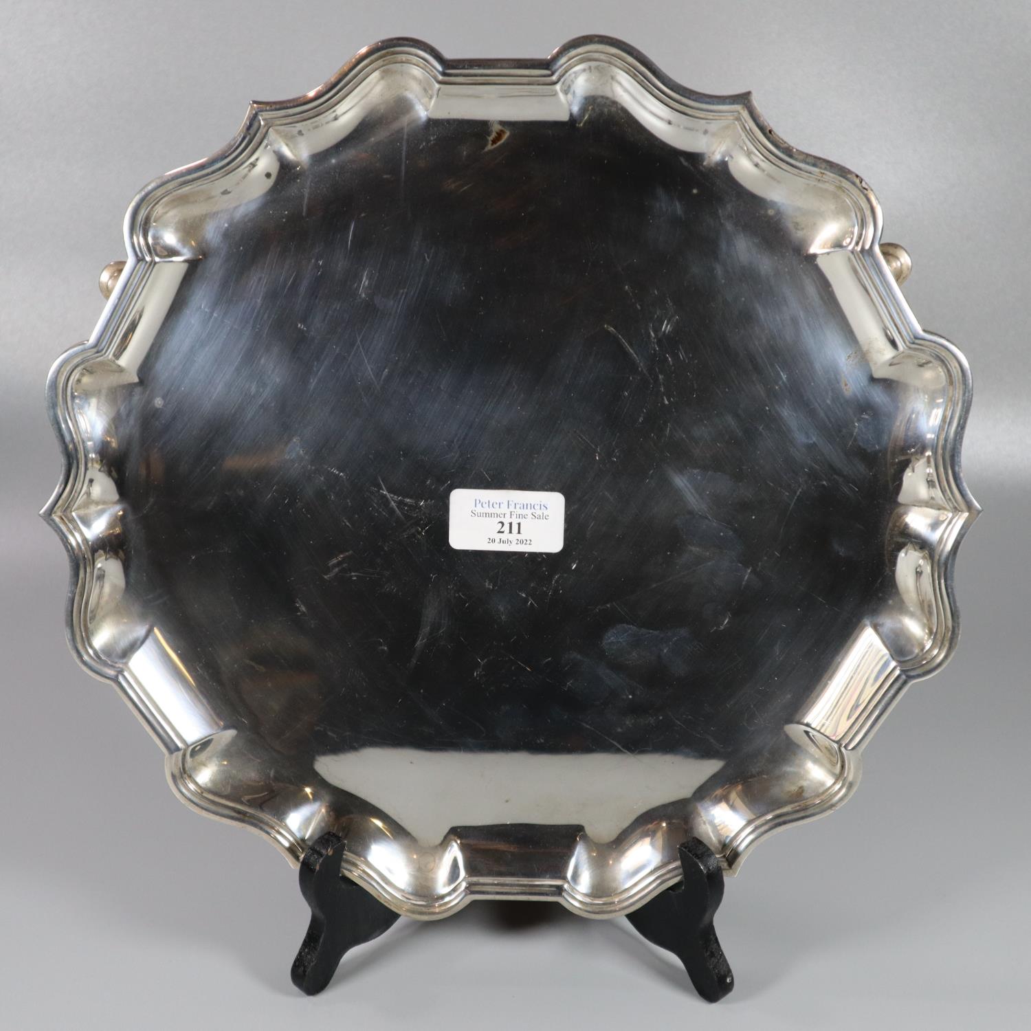 Edward VII silver salver of pie crust form standing on three hoof feet by C S Harris & Sons Ltd