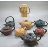 A collection of modern reproduction Chinese teapots being the 'Teapots of Yixing', eight small