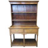 19th century oak two stage pot board dresser of narrow and small proportions, the moulded cornice