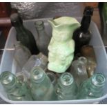 Box containing mostly glass bottles; cod bottles marked George Thomas, Tenby & Pembroke dock and