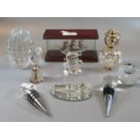 A collection of glassware to include; Swarovski design teddy bear, paperweights; one in the form