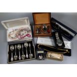 Shoebox of items to include; cased set of six spoons with fox terminals, various costume