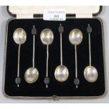 Cased set of six silver coffee bean spoons. 1.2 troy ozs approx. (B.P. 21% + VAT)