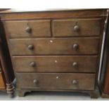 19th Century oak straight front chest of two short and three long drawers, having turned handles