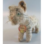 A vintage Steiff "Tabby" cat, stud to its ear and label. 15cm long overall approx. (B.P. 21% + VAT)