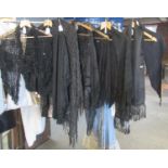 Collection of Victorian and Edwardian black shawls and scarves to include; crepe shawl with