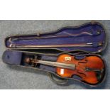 Stradivarius copy violin, with two bows, in fitted case. Label to the interior. (B.P. 21% + VAT)