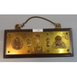 Brass mounted wooden panel set with military badges including: Royal Engineers, Welsh Guards and the