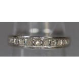 9ct white gold diamond set half hoop eternity ring. 1.4g approx, size L. (B.P. 21% + VAT)