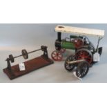 Mamod spirit fired miniature steam traction engine. Together with pullies on stand and a small brass
