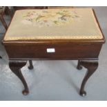 Early 20th Century mahogany piano stool on cabriole legs, the hinged lid revealing a tray of