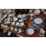 Three trays of Wedgwood English bone china items in blue Siam pattern with Greek key border to