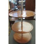 Mid Century mahogany three tier cake stand or dumbwaiter with chrome supports. (B.P. 21% + VAT)