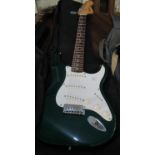 Squire Strat by Fender 6 string electric guitar, 20th Anniversary, in green and white, with canvas