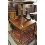 19th century mahogany pedestal snap top dining table with baluster turned pillar on tri form base,