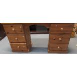 Modern natural pine two pedestal knee hole desk, with three fitted drawers to each side. 145cm