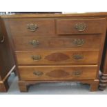20th Century walnut straight front chest of two short and three long drawers, with brass carrying