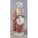 Lladro Spanish porcelain figurine of 'Mrs Santa' 6893 from Santa's Magical Workshop, with original