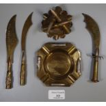 Trench art items to include; brass ashtray 'Ypres', another brass ashtray with bullet mounts 'Ypres,