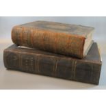 Two 19th Century Welsh leather bound bibles. (2) (B.P. 21% + VAT)