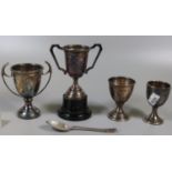 Two similar silver eggcups (1.47 troy ozs approx). Together with a silver teaspoon and two miniature