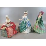 Three Royal Doulton bone china figurines to include; 'The Paisley Shawl' HN1460 potted by