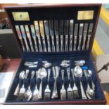 Cased mahogany finish canteen of 'Tudor' silver plated cutlery. (B.P. 21% + VAT)