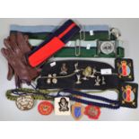 Tray of militaria to include; belts, various blazer badges, insignia and a dress cap labelled G.D