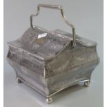 A late Victorian or Edwardian plated metal biscuit box with swing handle and two lidded