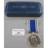 Royal Mint Queen Elizabeth II 'For Exemplary Police Service' medal with ribbon in original box.