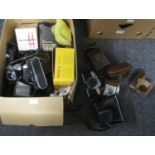 Box of cameras and accessories to include; Kodak DC20 digital camera in box, Kodak Brownie