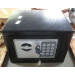 Small lightweight black safe with combination lock and keys. (B.P. 21% + VAT)
