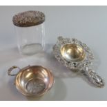 Silver topped and glass lady's dressing table jar, together with a silver tastevin with Birmingham