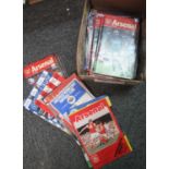Collection of football programmes, many appearing to be Arsenal, Swansea City, FA Cup Semi-Final