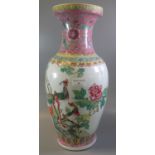 20th century Chinese porcelain polychrome decorated baluster shaped vase, decorated in famille-