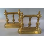 Pair of 19th century cased brass and cast iron andirons. 19cm wide approx. (2) (B.P. 21% + VAT)