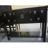 Modern Chinese design ebonised side or console table with an arrangement of drawers and under