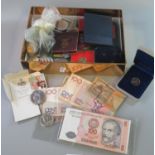 Box of assorted and mixed coins and banknotes to include; Queen Elizabeth II and George V crowns,