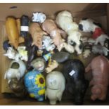 Box of pig ornaments to include: ceramic pigs, piggy banks, glass, Wade whimsy, shell, carved