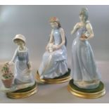 Lladro Spanish porcelain figurine of young girl kneeling with a pot of flowers, together with a