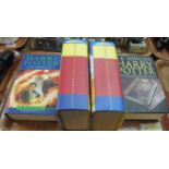 Four copies of first edition of Harry Potter books: two copies of 'Harry Potter and the Half Blood