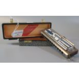 A M and M Hohner Super 'Chromonica' harmonica as played by Larry Adler. Original box. (B.P. 21% +