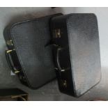 Pair of matching imitation crocodile skin suitcases in black with brass fittings and red