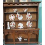 19th century style oak miniature rack back pot board dresser with assorted miniature china