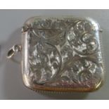 Foliate engraved silver vesta case with Birmingham hallmark. 1.1 troy ozs approx. (B.P. 21% + VAT)