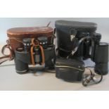 Pair of Swift Audubon 8.5/44 extra wide field binoculars in leather case, together with a pair of