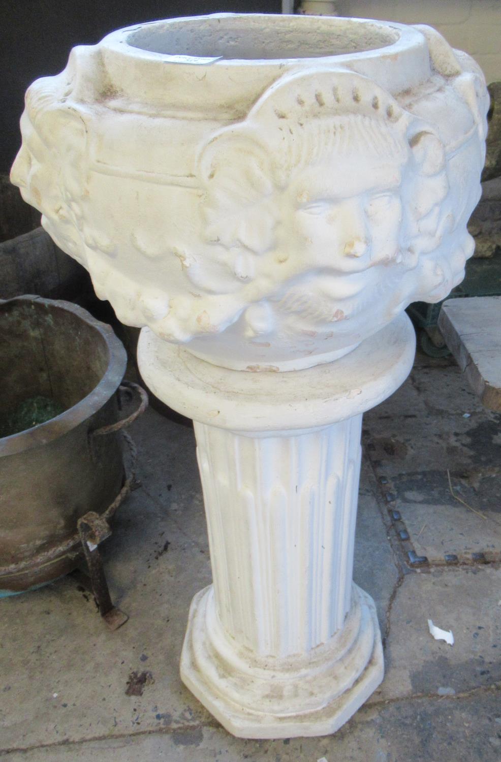 Moulded composition pedestal planter with mask mounts. 86cm high approx. (B.P. 21% + VAT)